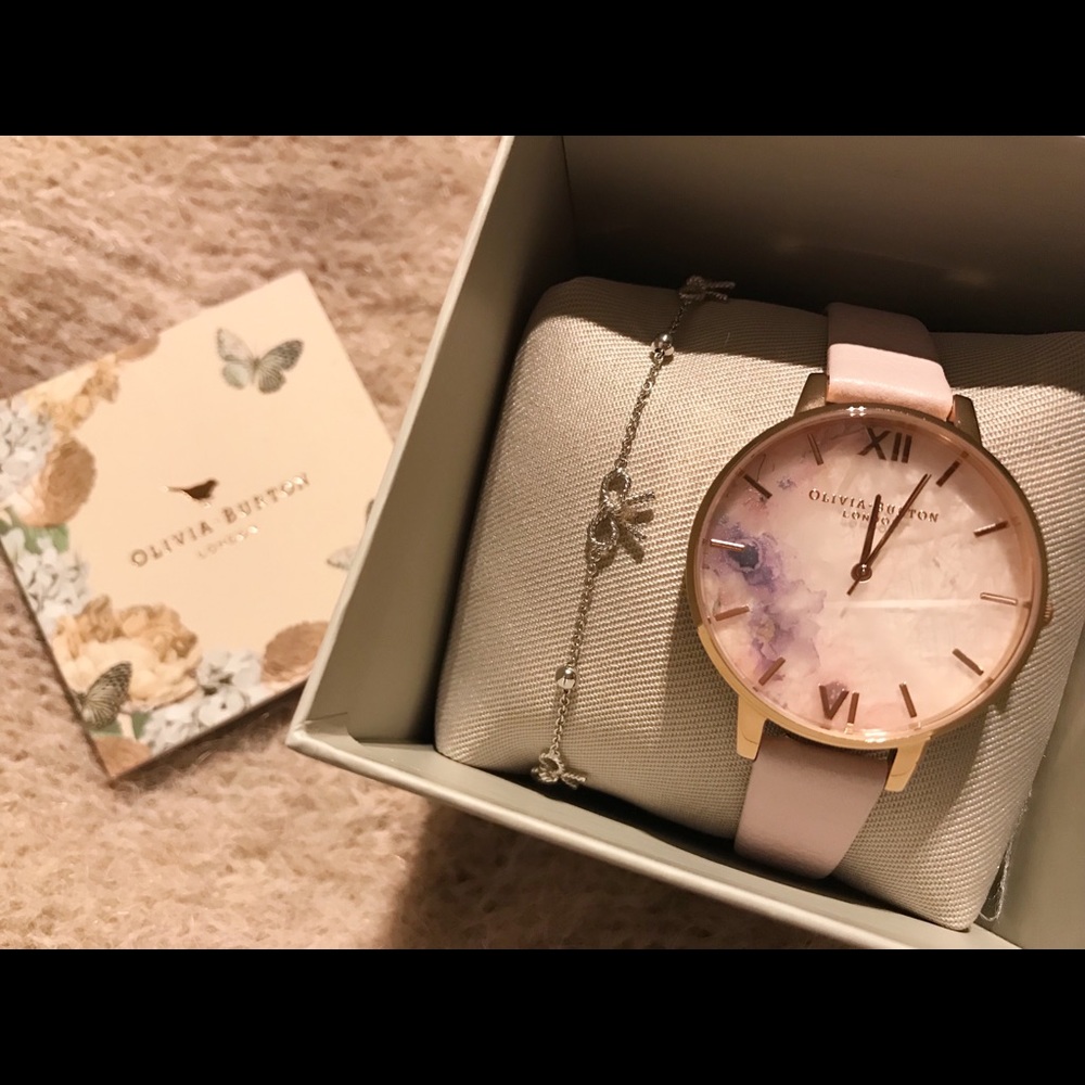 Olivia Burton semi previous rose gold watch